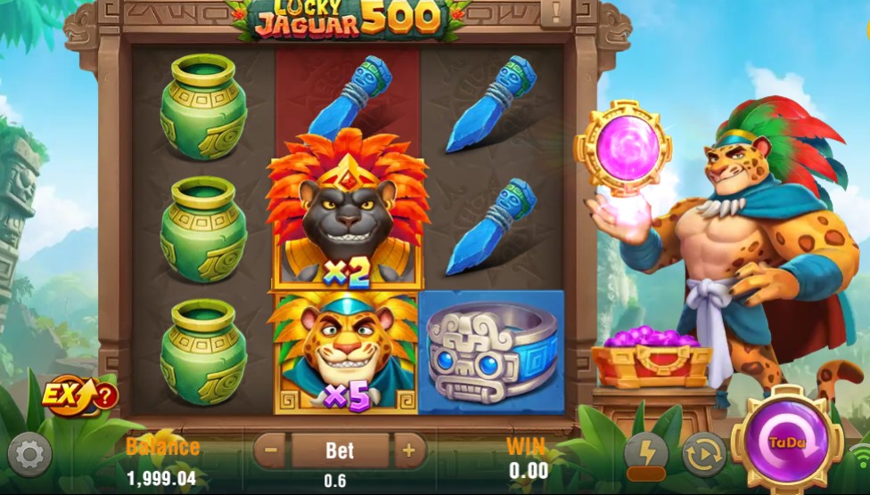 Logotipo de TaDa Gaming junto a los carretes de Lucky Jaguar 500 en una pantalla de escritorio
